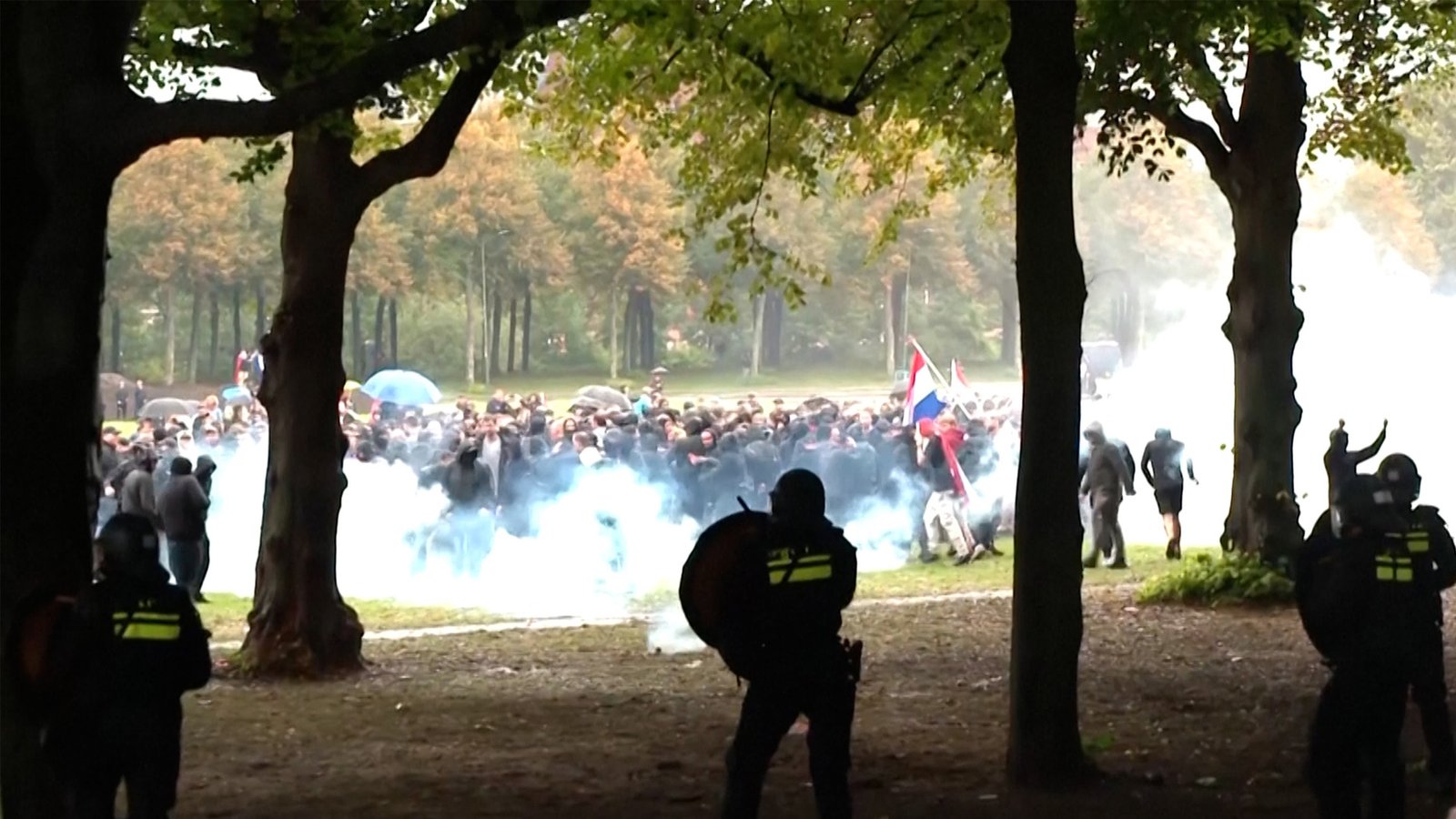 Police fire tear gas at anti-immigration protesters in The Hague | The Far Right