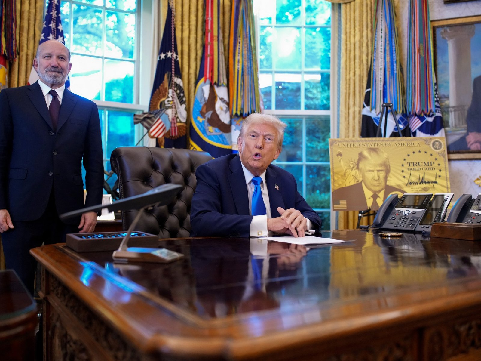 Trump signs proclamation creating $100,000 application fee for H-1B visas | Donald Trump News